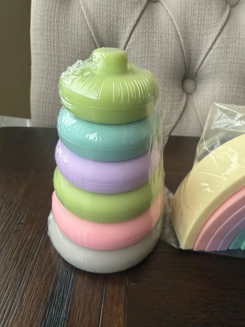 NWOT baby silicon rainbow and stacking tower